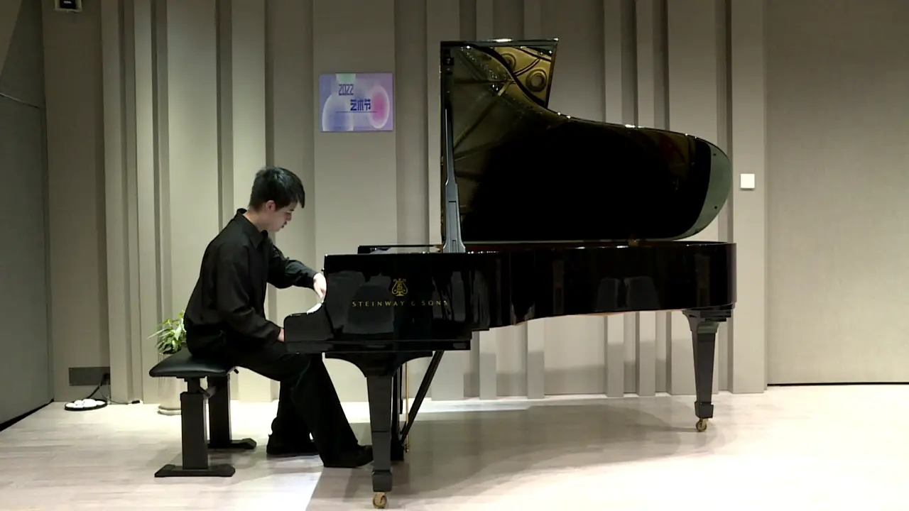 Still from Lala’s solo piano performance